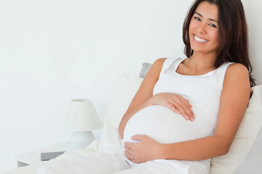 Pregnant woman smiling